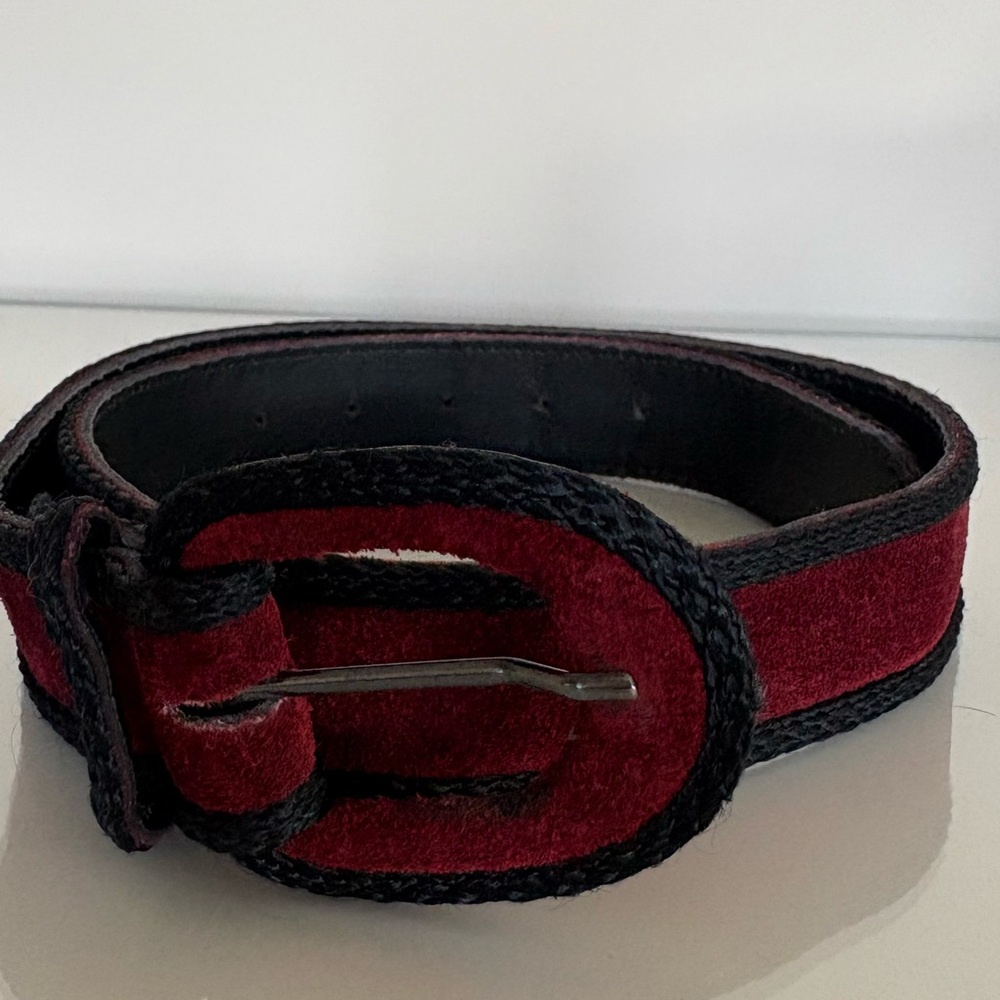 Vintage Yves Saint Laurent suede belt.  Burgundy with black trim.  Size medium.